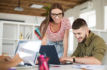 Creative digital marketing consultants brainstorming new ideas for SMEs.